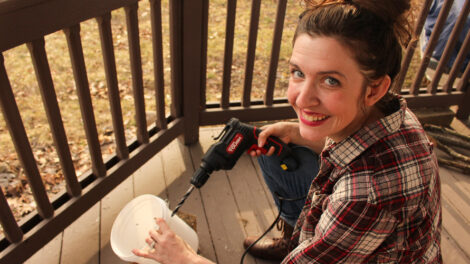 Erin Hamilton - drilling mushroom buckets - the mushroom conservatory.